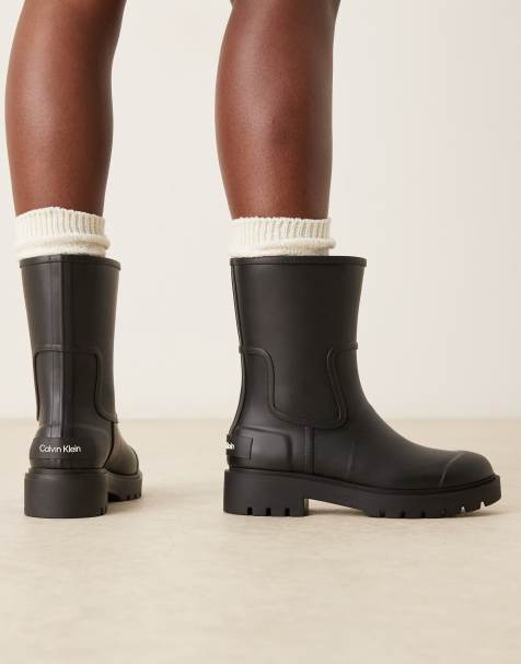 Calvin Klein short wellington boots in black - view 1