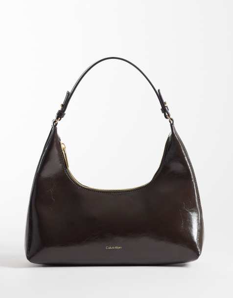 Calvin Klein sleek foil logo shoulder bag in glossy chocolate brown - view 1