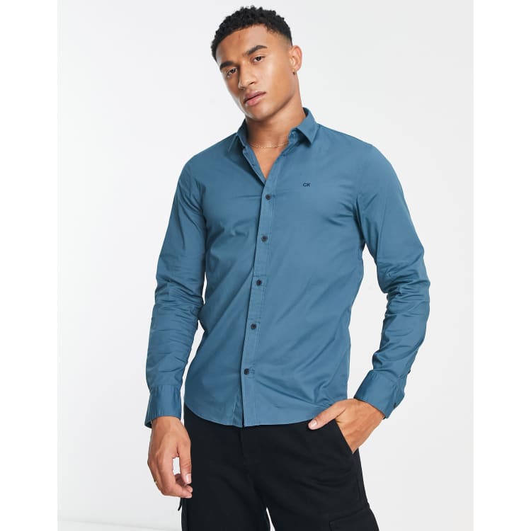 Calvin Klein Slim fit poplin overhemd met stretch in blauw ASOS