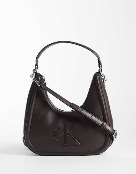 Calvin Klein small crescent bag with bold logo in chocolate brown - view 1