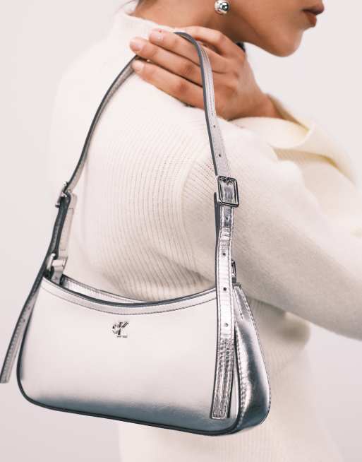 carol silver leather mini backpack with central zip Sandy Linen Astor Top Handle friendly bag that carries like a backpack or duffel Product Results - Collectibles By