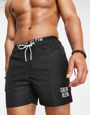 Calvin Klein small thigh logo swim shorts in black