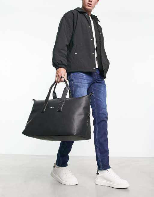 Calvin Klein - Sort weekendtaske i piqué 