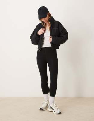 Calvin Klein Sport - Wattierte Jacke in Schwarz mit kurzem Schnitt