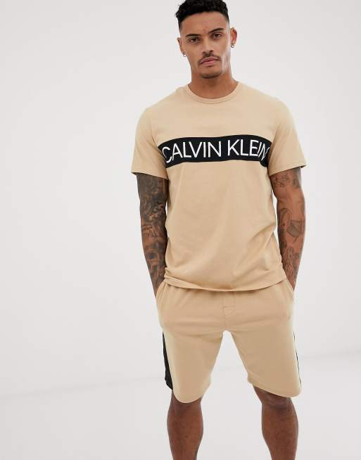 Calvin Klein Statement 1981 bold logo crew neck t shirt in sand ASOS