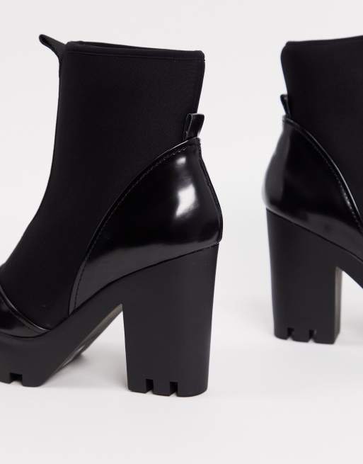 Calvin Klein stefania neoprine logo heeled boots in black ASOS