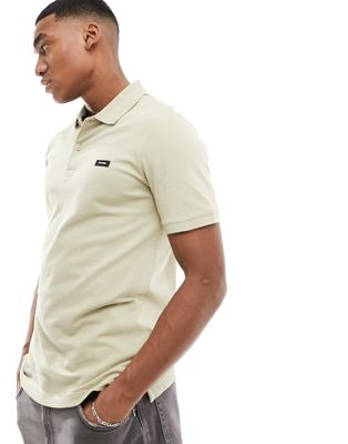 Calvin Klein stretch pique slim button polo shirt in cream