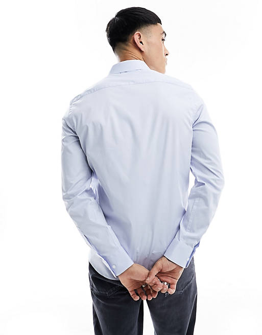Calvin Klein stretch poplin slim shirt in light blue | ASOS