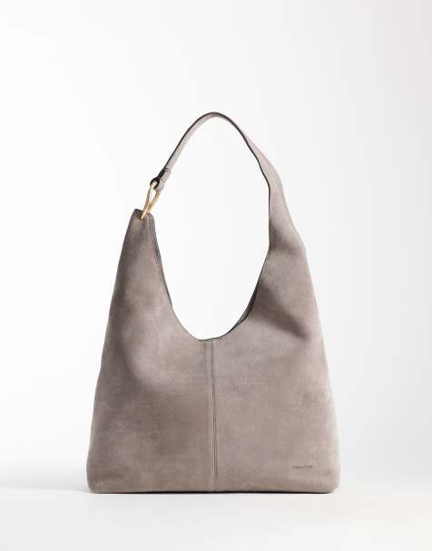 Calvin Klein suede large shoulder bag in taupe - view 1