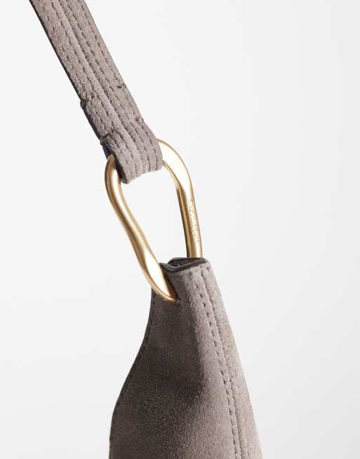 Calvin Klein suede large shoulder bag with gold detail in beige, 3 of 4