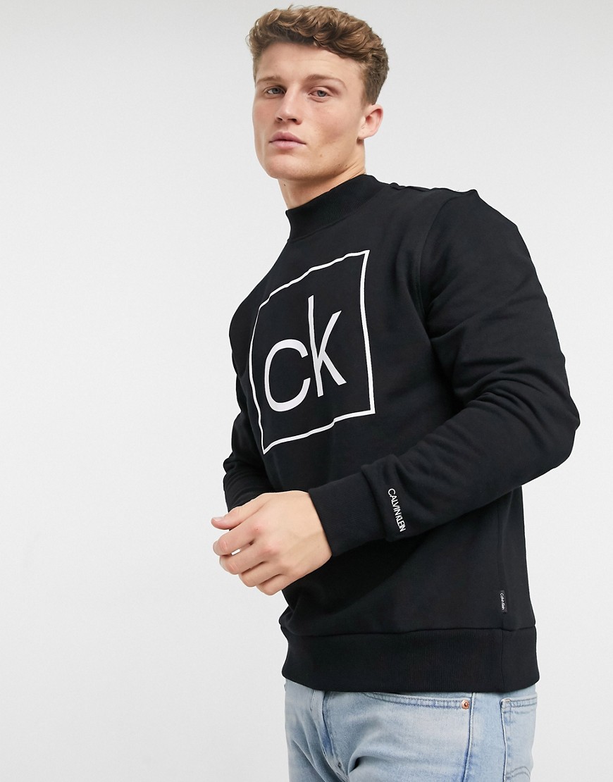 Calvin Klein – Svart flockad sweatshirt med logga på ryggen