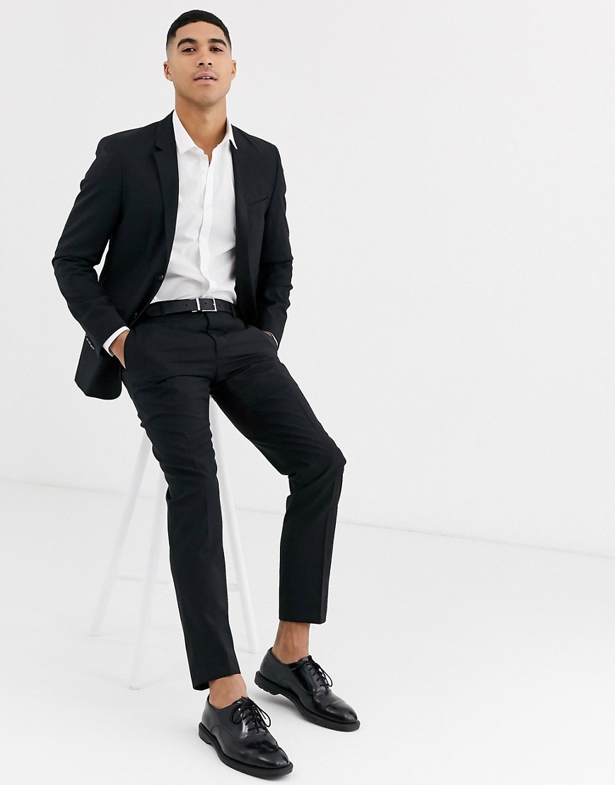 Calvin Klein – Svarta kostymbyxor i bearbetad ull