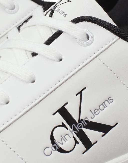 Calvin Klein – Svartvita, klassiska sneakers med kupad sula, 4 av 5
