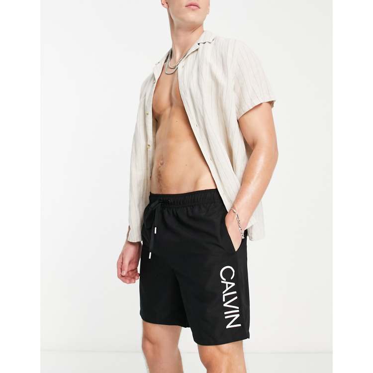 Calvin Klein swim shorts in black | ASOS