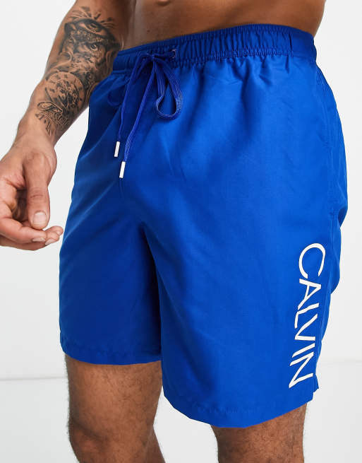 Calvin Klein swim shorts in blue ASOS