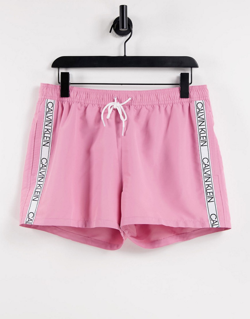 Calvin Klein swim shorts with side logo taping in pink