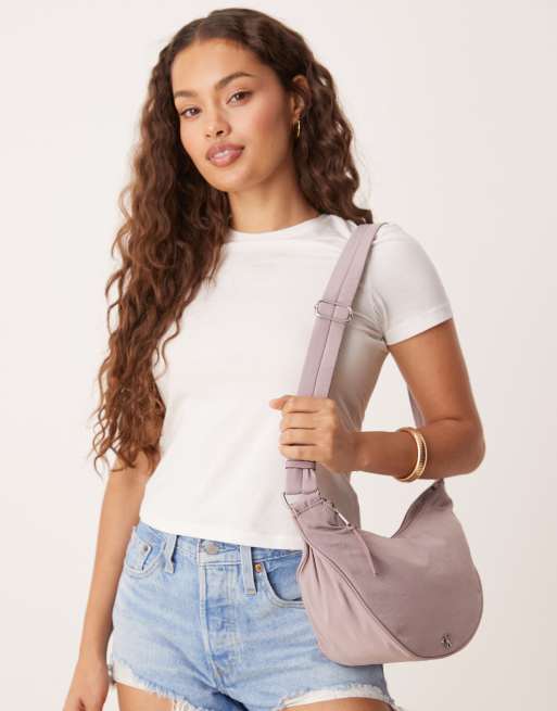 Calvin Klein – Syrénlila axelremsväska i nylon