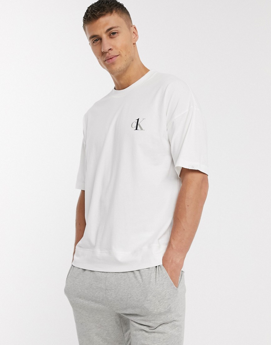 Calvin Klein - T-shirt girocollo da casa con logo CK One bianca-Bianco