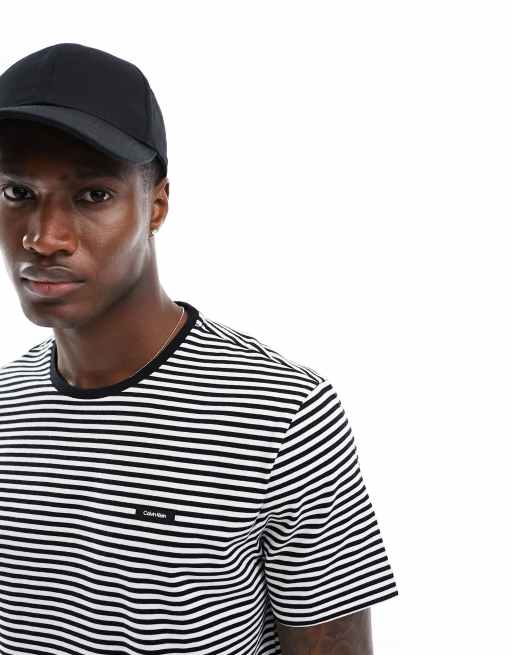 Calvin Klein - T-shirt in cotone nera e bianca a righe
