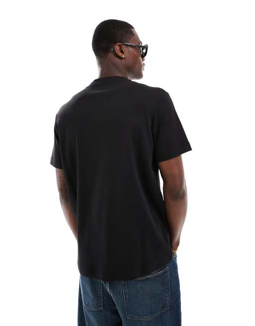 Calvin Klein - T-shirt met logo in reliëf in zwart, 2 van 4