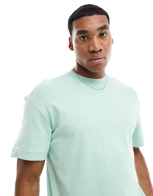 Calvin Klein - T-shirt verde menta con logo centrale
