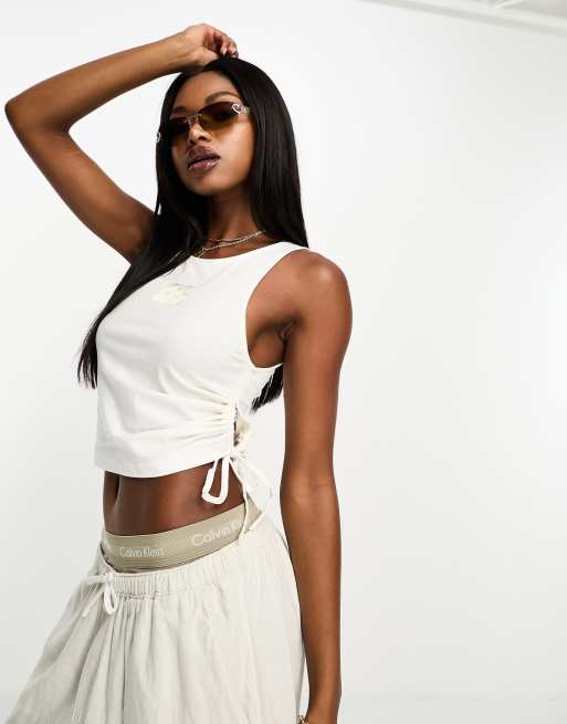 Calvin Klein Cropped Tank Top  White crop top tank, Calvin klein outfits,  Tank top urban outfitters