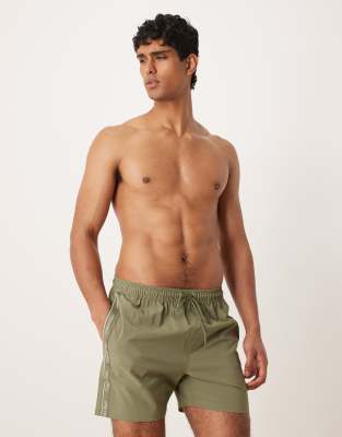 Calvin Klein taped drawstring swim shorts in khaki-Green
