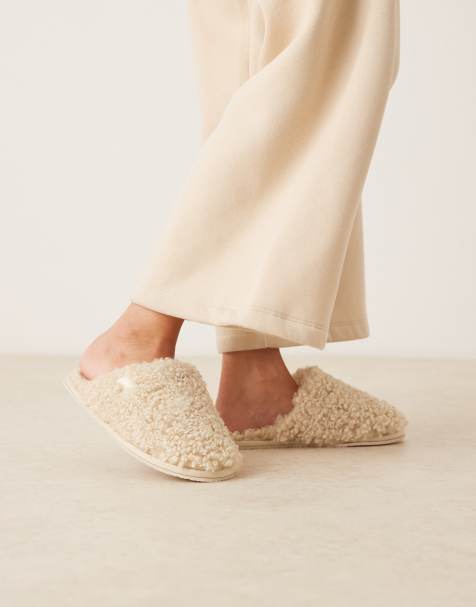 Calvin Klein teddy fur slippers in cream - view 1