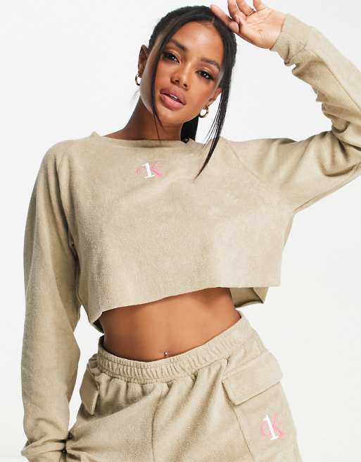 Clancy aankomen Beeldhouwwerk Calvin Klein terry crop sweatshirt in cream | ASOS