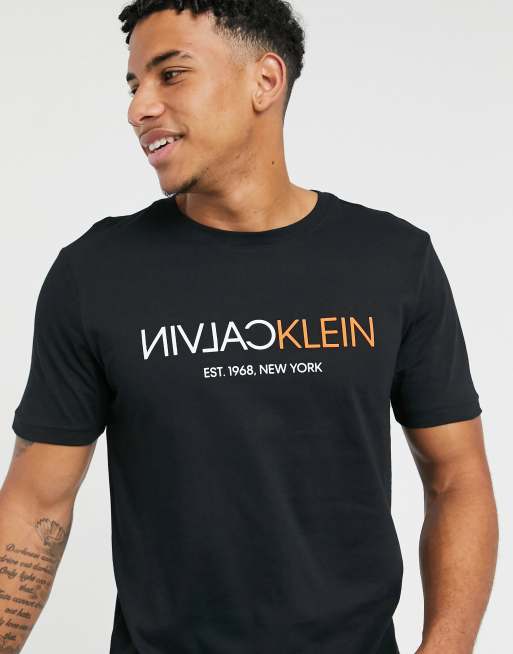 Calvin Klein text reverse chest logo T-shirt in black, ASOS