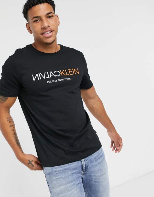 Calvin Klein text reverse chest logo T-shirt in black, ASOS