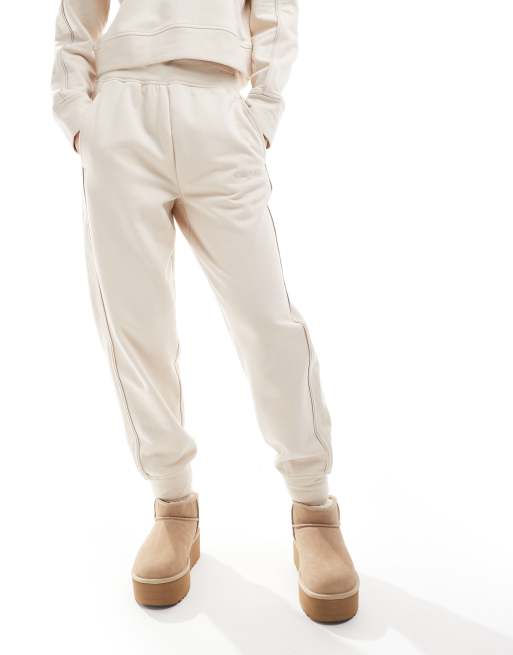 Calvin Klein Tonal Logo lounge jogger with logo waistband in cream ASOS