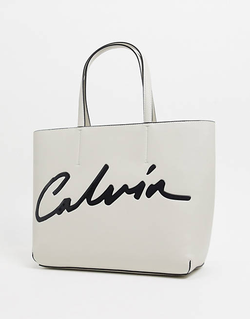 Calvin Klein tote bag with script logo in stone | ASOS