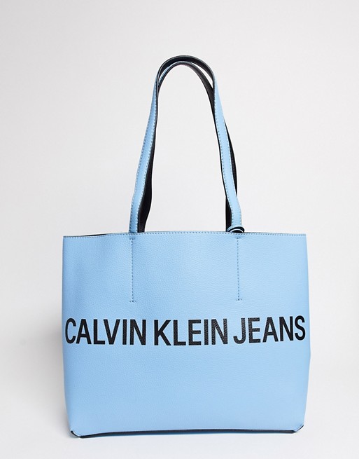 Calvin Klein ultra light reversible tote in light blue
