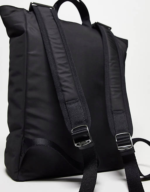 Calvin Klein utility pocket tote backpack in black | ASOS