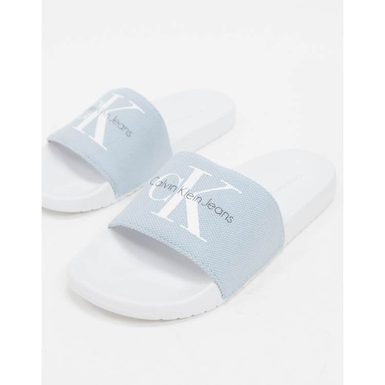 Calvin Klein viggo logo sliders in light blue ASOS