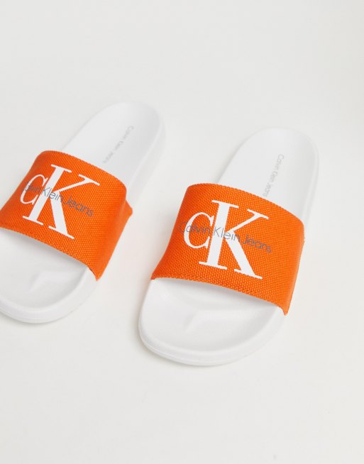 Orange calvin 2024 klein sliders