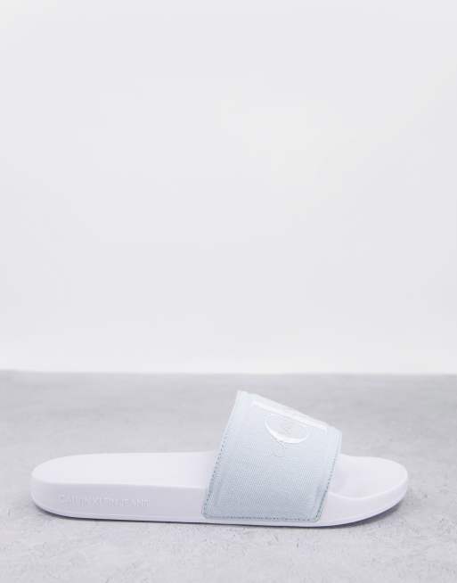 blue calvin klein sliders