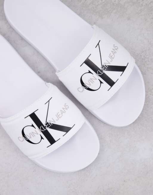 White calvin hot sale klein slides