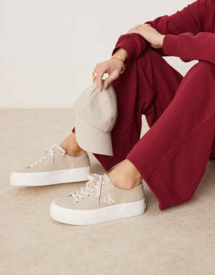 Calvin Klein vulc flatform canvas trainers in beige