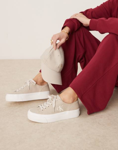 Calvin Klein vulc flatform canvas trainers in beige - view 1