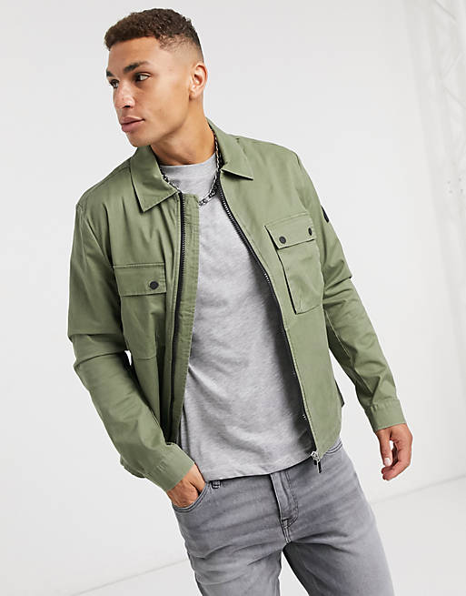 Calvin Klein washed shirt jacket in khaki | ASOS