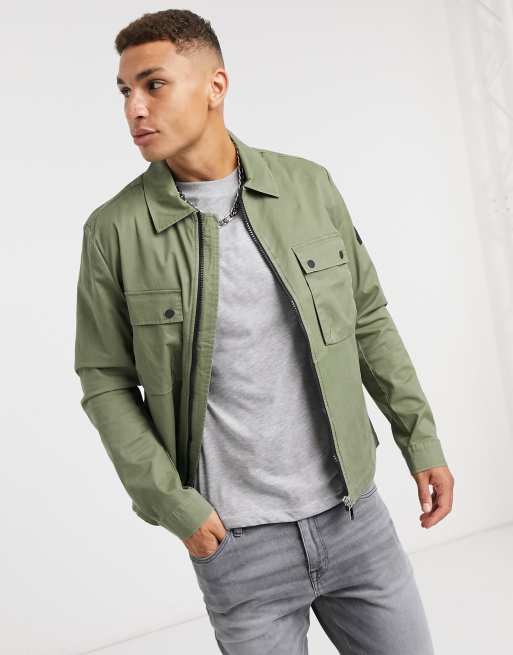 Calvin Klein washed shirt jacket in khaki | ASOS