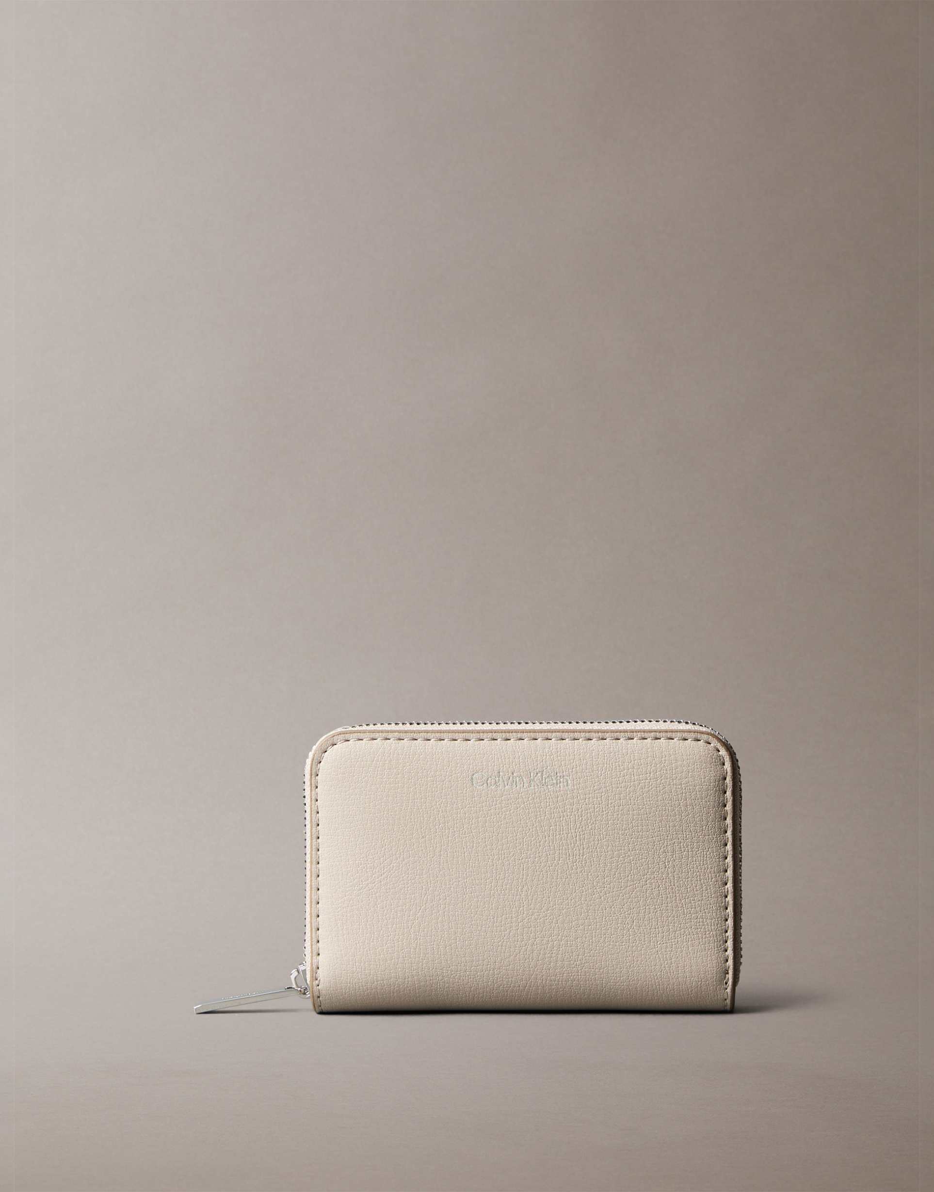 calvin klein zip wallet in white