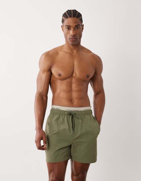 Calvin Klein - Zwemshort met logo op de tailleband en trekkoord in groen - view 1