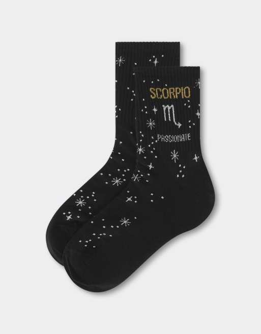 Calzedonia Astrology collection socks in black, 3 of 4