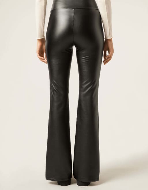 Calzedonia Coated-effect thermal flared trousers in black, 2 of 5
