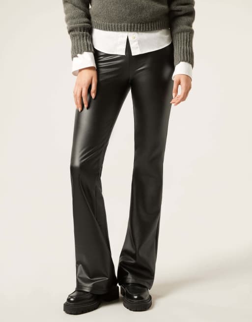 Calzedonia Coated-effect thermal flared trousers in black, 4 of 5