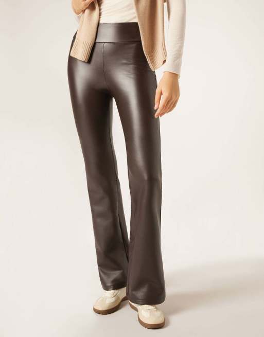 Calzedonia Coated-effect thermal flared trousers in brown, 4 of 5