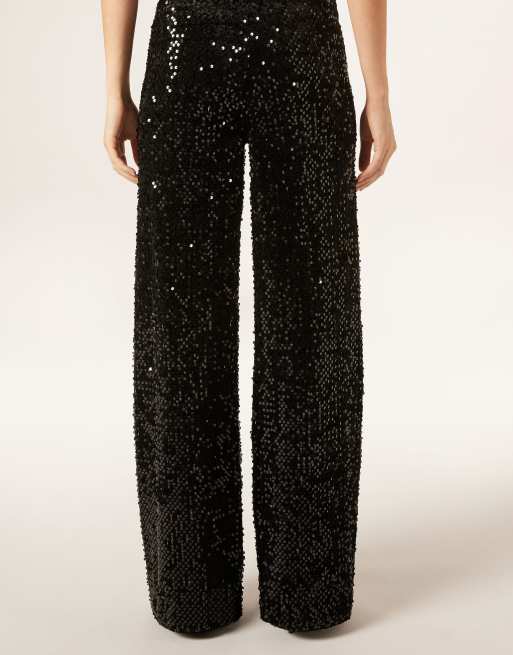 Calzedonia Velvet and sequin palazzo trousers in black, 2 of 3